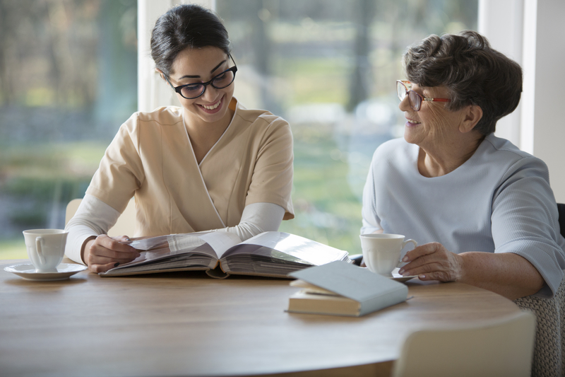 Senior woman with tender caregiver Senior woman with tender caregiver Qualified carers from Wawcare supporting clients in their own homes