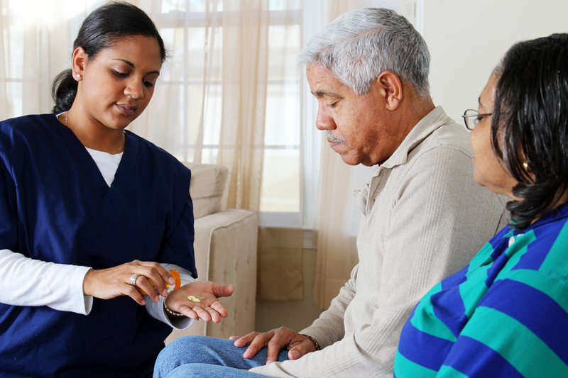 Home Health Care Home Health Care Care assistant helping client with daily activities at home